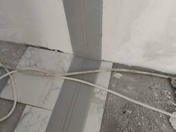 Профиль для маскировки деформационных швов в полах