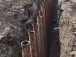 Устройство ограждения трубошпунтом котлована при строительстве многоэтажного жилого дома - фото 3